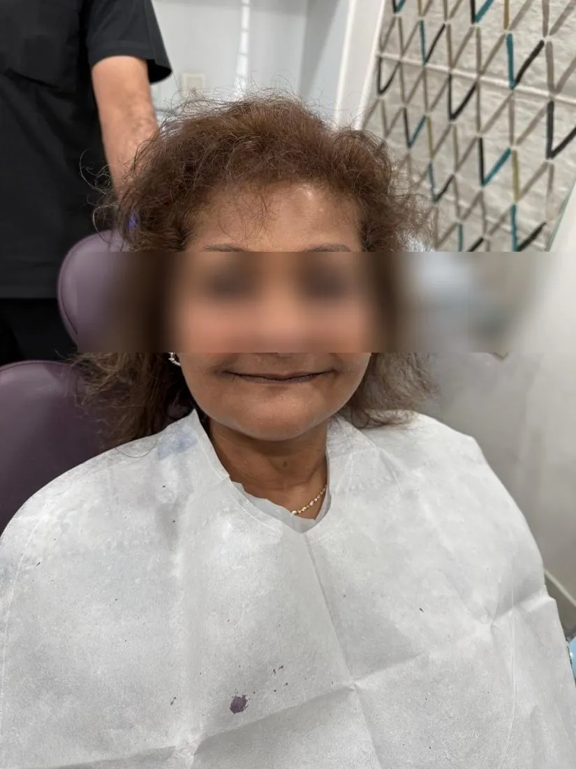 Patient portrait smiling, eyes blurred